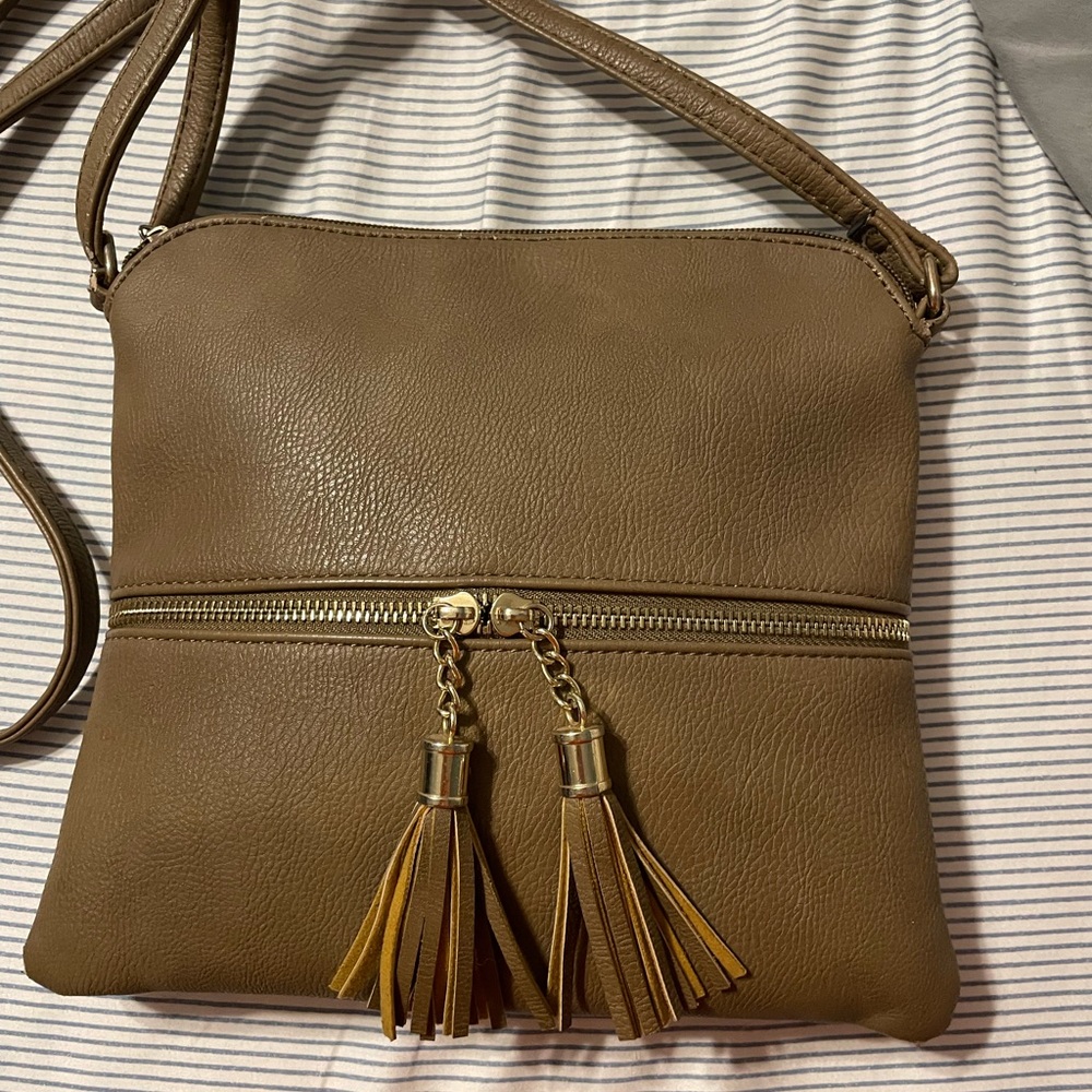 Women’s dark tan satchel. Some pen stains inside, but hidden